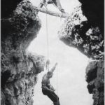 Man dives into a cave