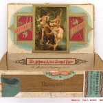Image of a cigar box with a painting of nude women in a forest