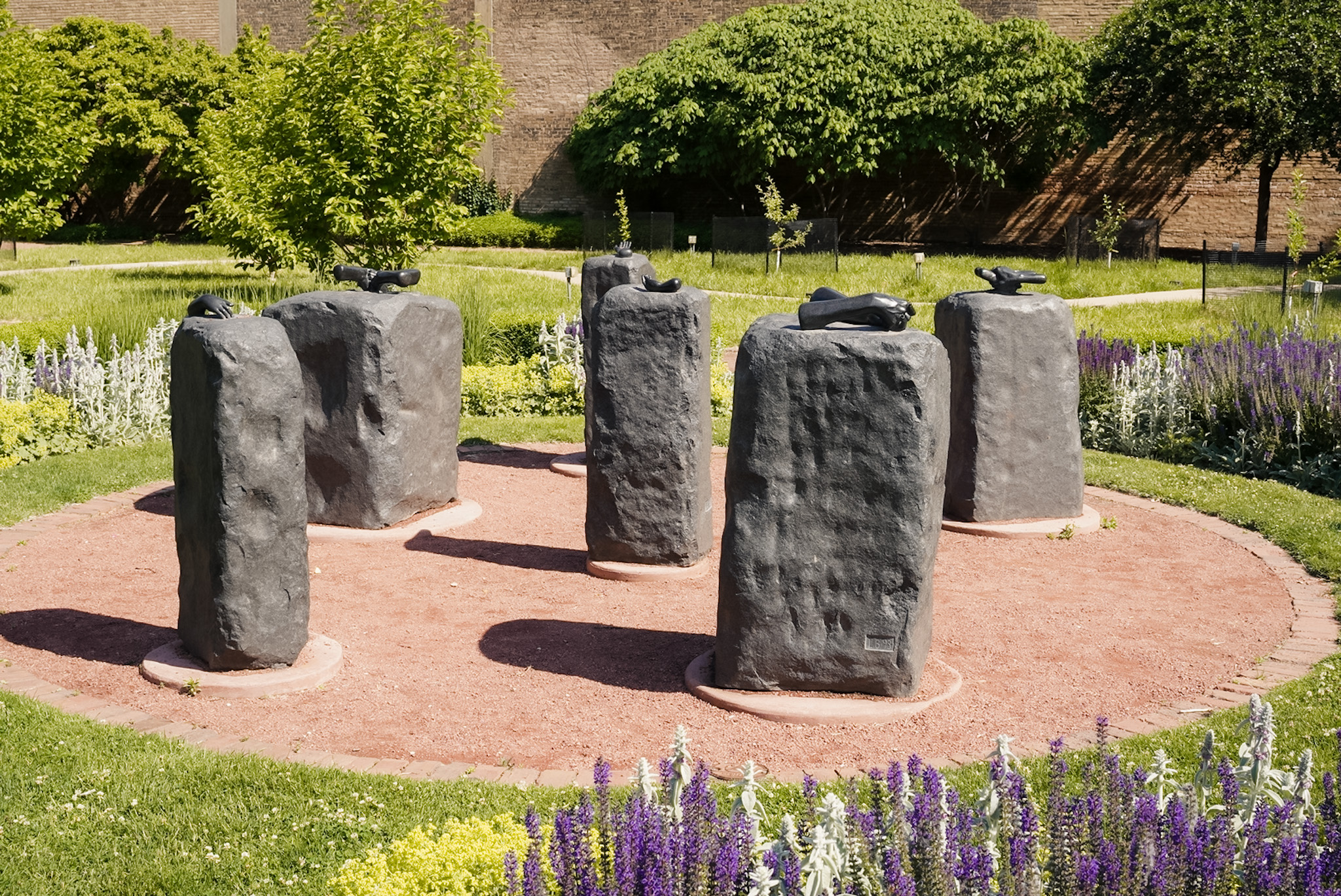 Abstract stone sculptural group in an outdoor setting