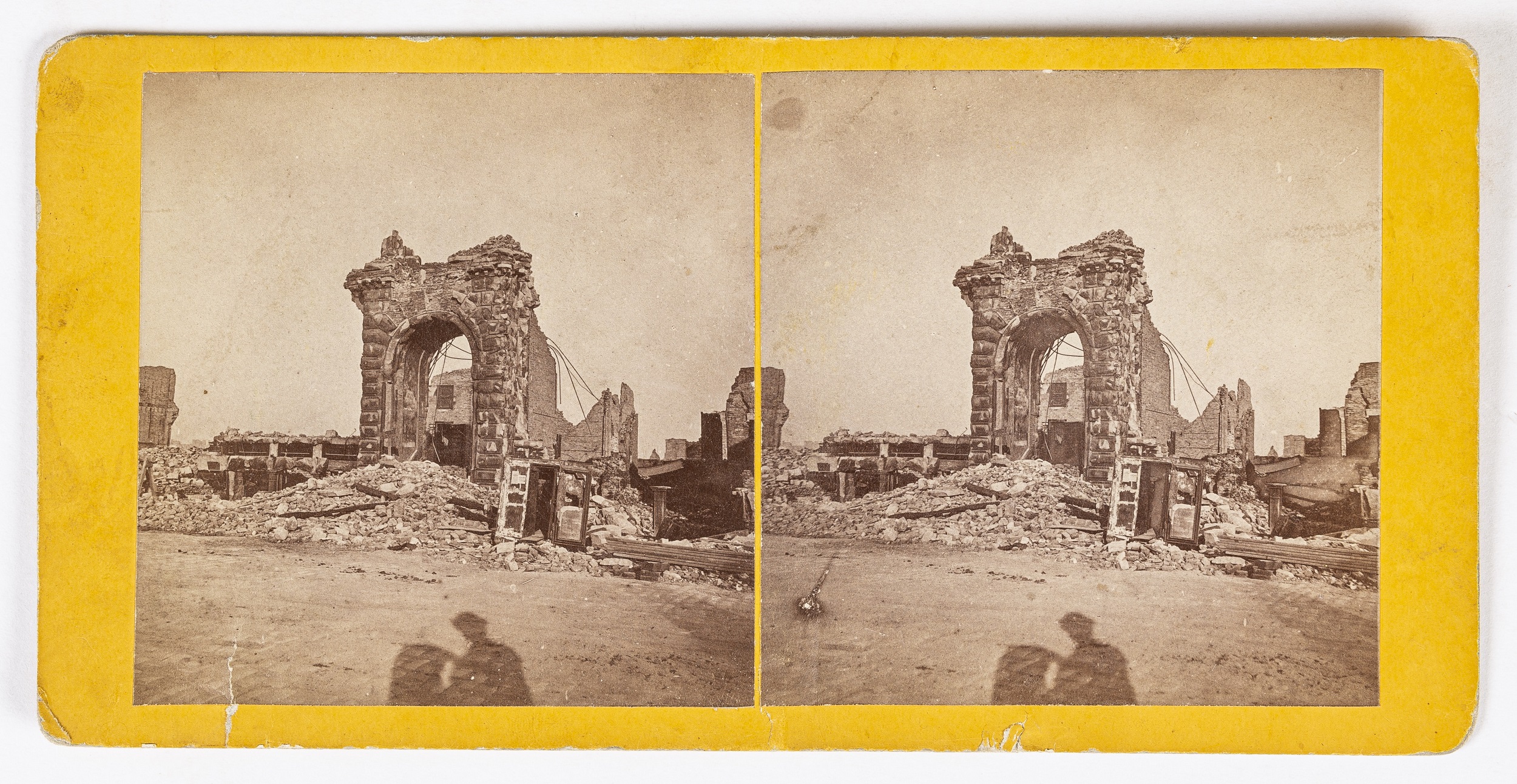 Photographic stereoview of a building ruined by fire