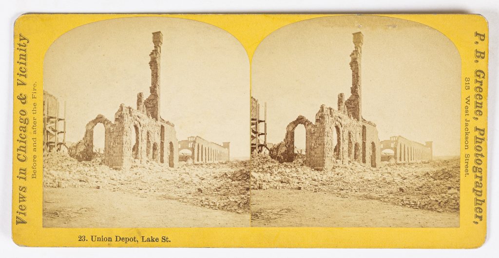 Photographic stereoview of a brick building ruined by fire
