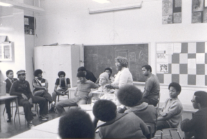 Selma Burke teaching high school to a group of African American students