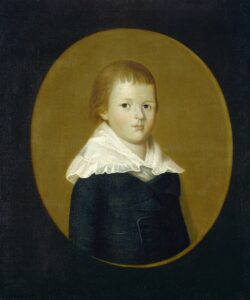 Painted oval portrait of a young boy in a dark suit and white collar