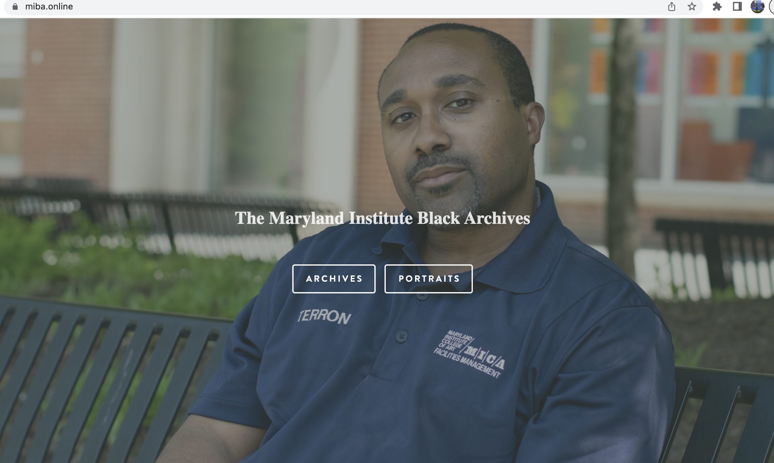 Screenshot of a website showing an African American man wearing a blue polo shirt with a logo reading "MICA." Text over the image reads "The Maryland Institute Black Archives," with two boxes underneath reading "Archives" and "Portraits"