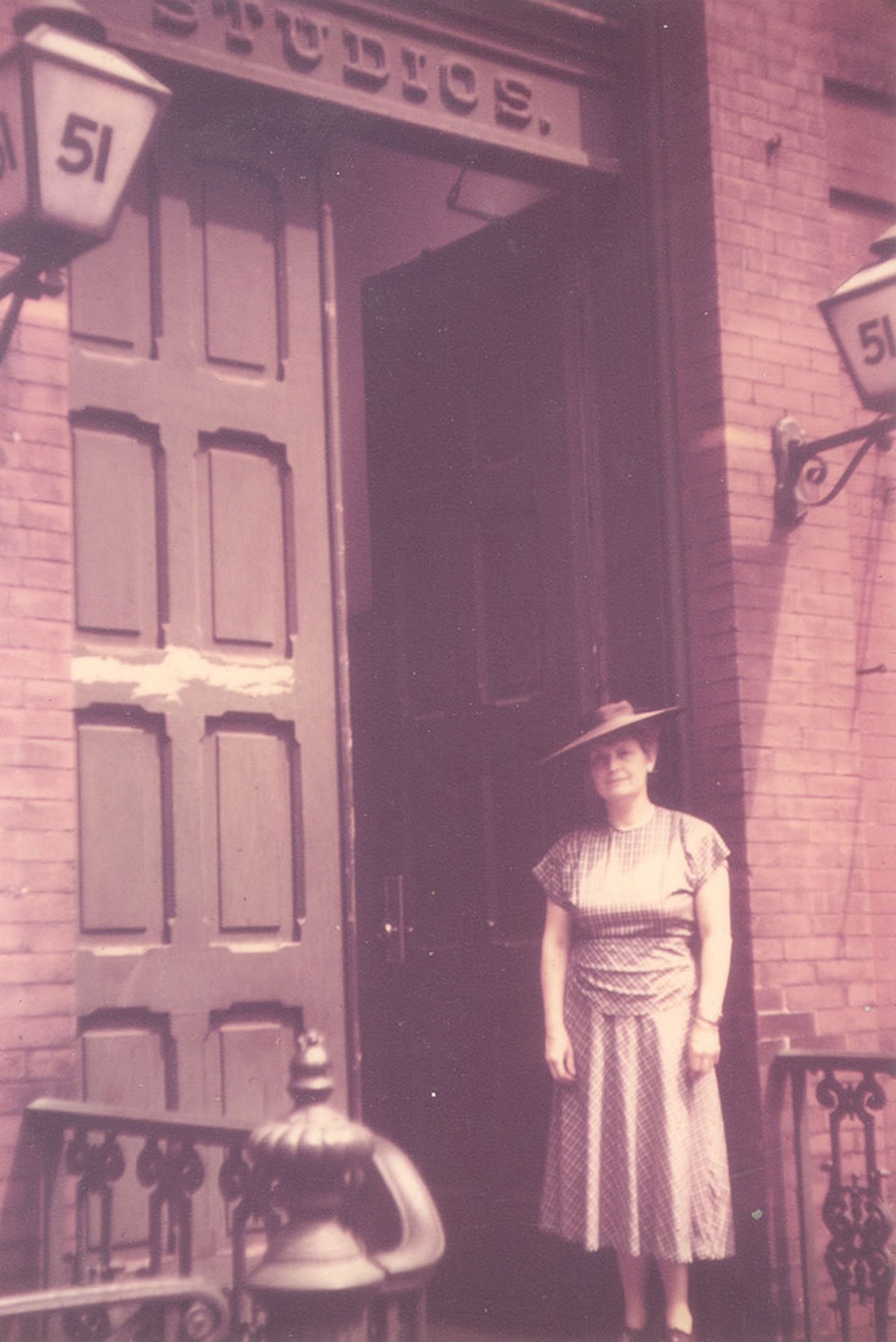 Woman in western style clothing aiming a gun - NYPL Digital Collections