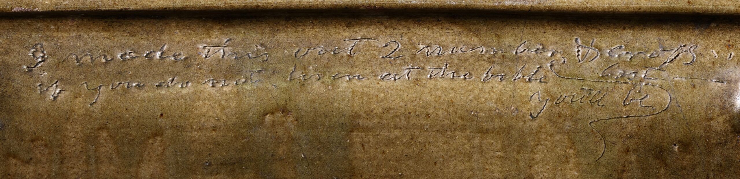 Close-up photograph of the inscription on the ceramic vessel in fig. 3, reading “I made this out of number, & cross ' ' / if you do not lisen at the bible you’ll be lost / L.m. march 25th 1859 / Dave.”