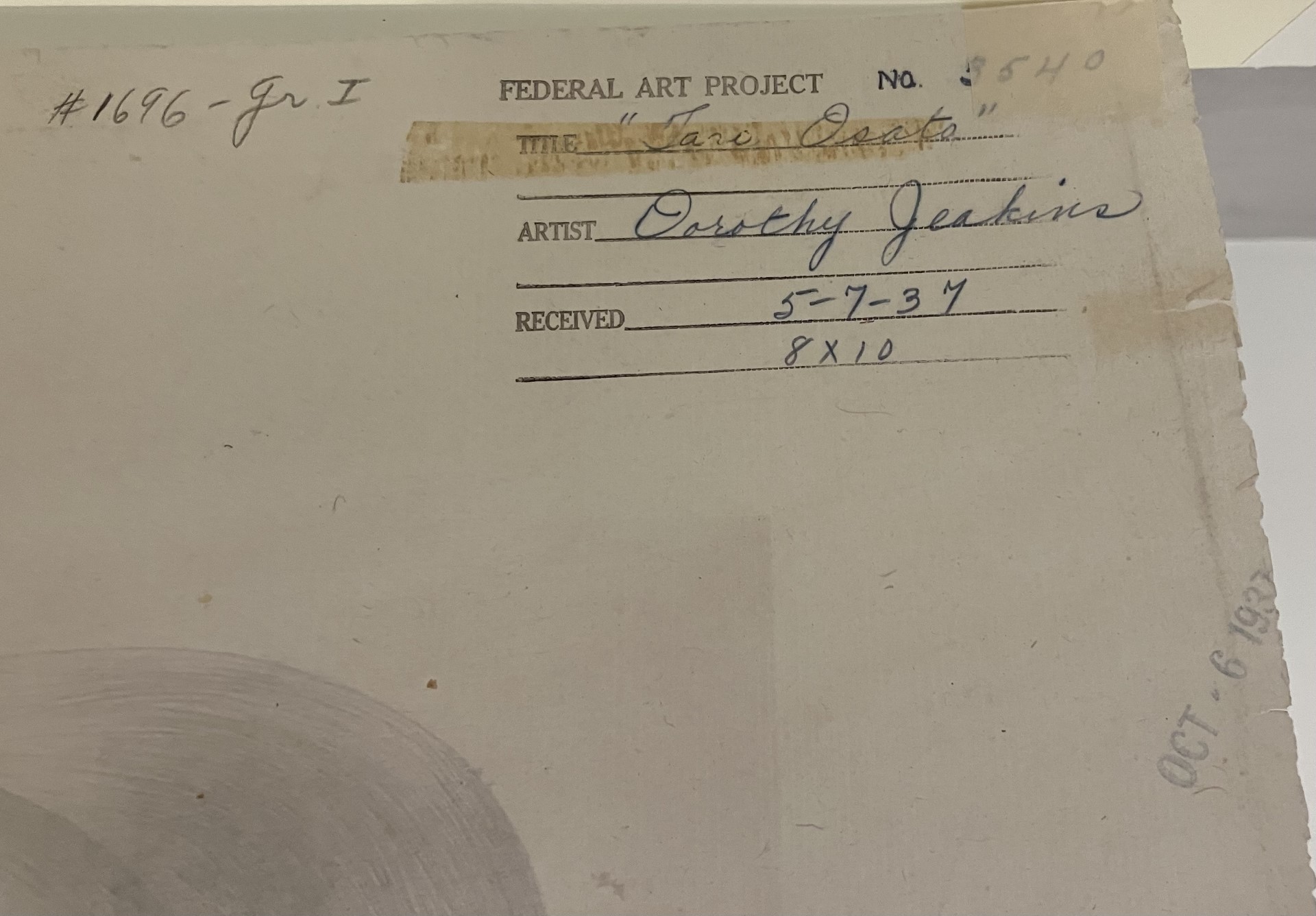 Top corner of a sheet of paper, with inscription reading "#1696 - Gr I." There is also a stamp with the header "Federal Art Project" with the following lines filled in with neat cursive writing: No. 3540; Title "Taro Osato"; Artist: "Dorothy Jeakins"; Received: "5-7-34 / 8 x 10"