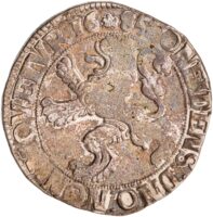 Silver coin with a rearing lion in the center. Along the edge are largely illegible letters.