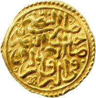 Gold coin with calligraphic designs and a dotted border.